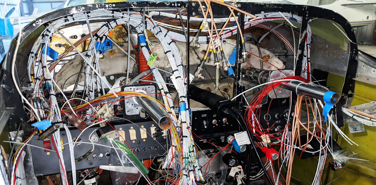 airplane with disassembled avionics panel